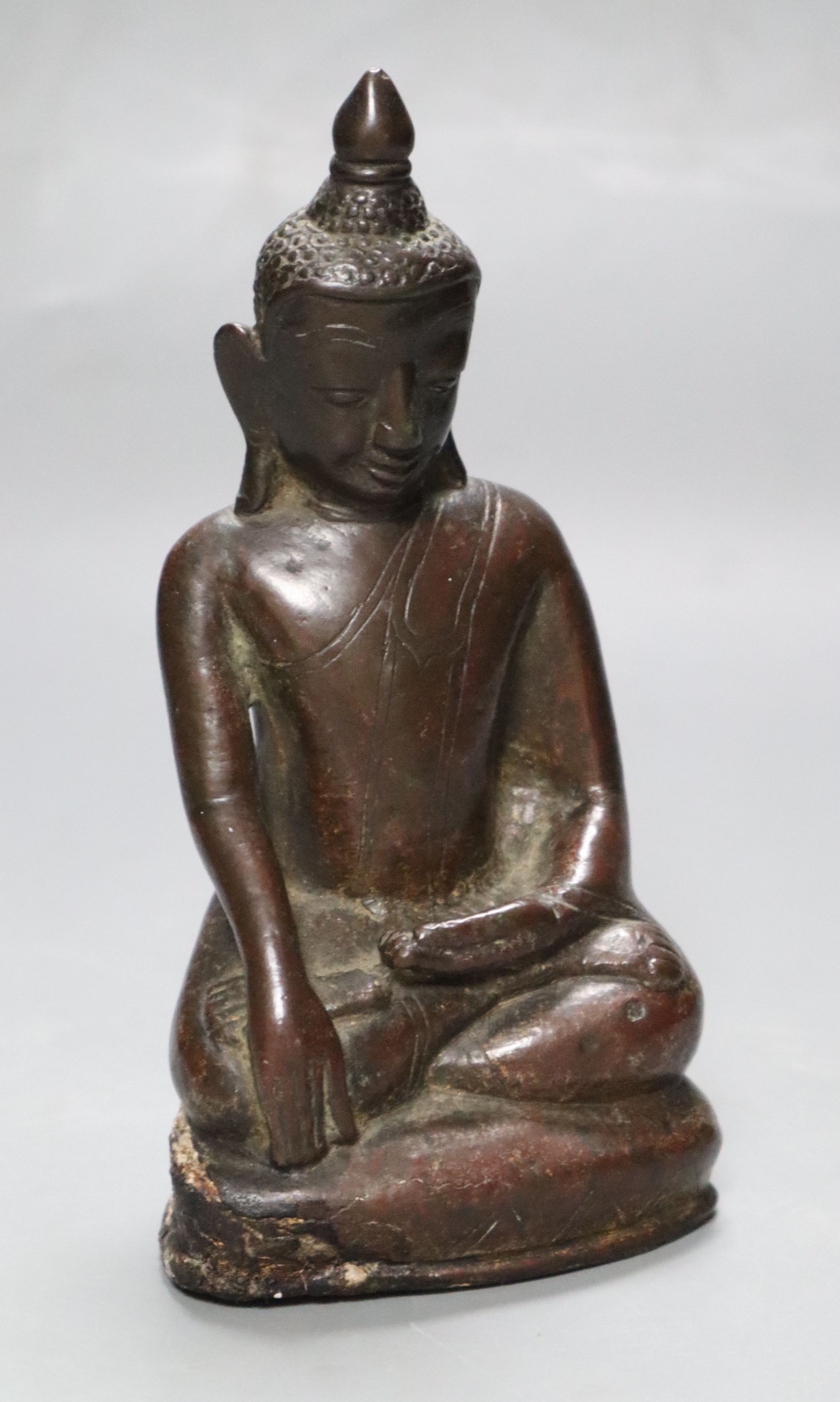 An 18th/19th century Burmese bronze figure of Buddha Shakyamuni, height 16cm